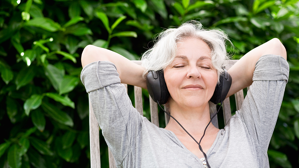 pfas-houston-summer-guide-woman-listening-to-music